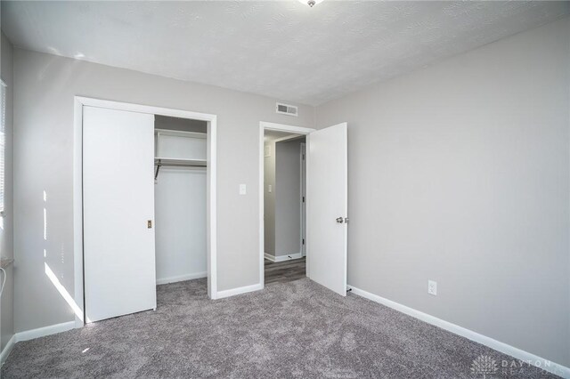 2525 Lakeview Ave, Dayton, OH 45417 - unfurnished bedroom with carpet flooring, a closet, and baseboards