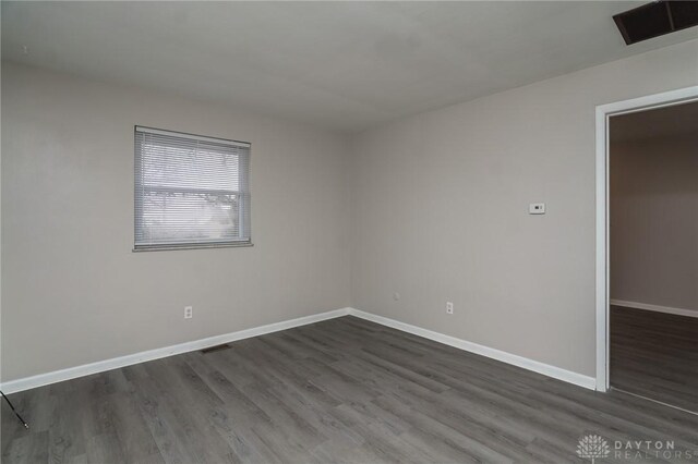 2525 Germantown St, Dayton, OH 45417 - unfurnished room featuring dark wood-style flooring and baseboards