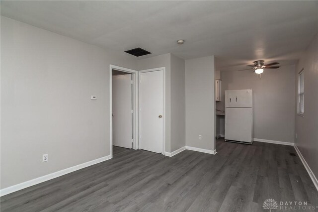 2525 Germantown St, Dayton, OH 45417 - unfurnished living room with baseboards, dark wood-style floors, and ceiling fan