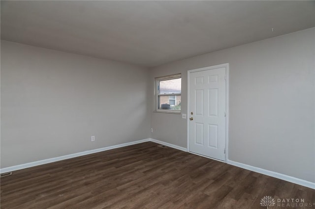 2525 Germantown St, Dayton, OH 45417 - unfurnished room featuring dark wood-style flooring and baseboards