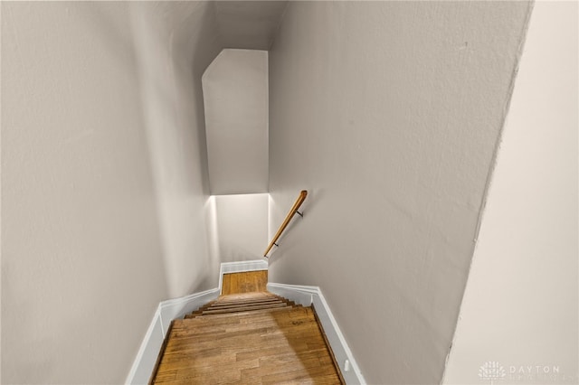 654 S Market St, Troy, OH 45373 - staircase with wood finished floors and baseboards