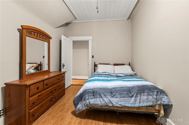 654 S Market St, Troy, OH 45373 - bedroom with light wood finished floors, wood ceiling, and baseboards