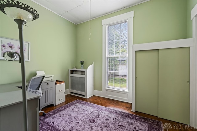 654 S Market St, Troy, OH 45373 - office area with crown molding, dark wood-style flooring, and baseboards