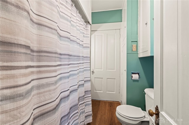 654 S Market St, Troy, OH 45373 - bathroom with toilet and wood finished floors