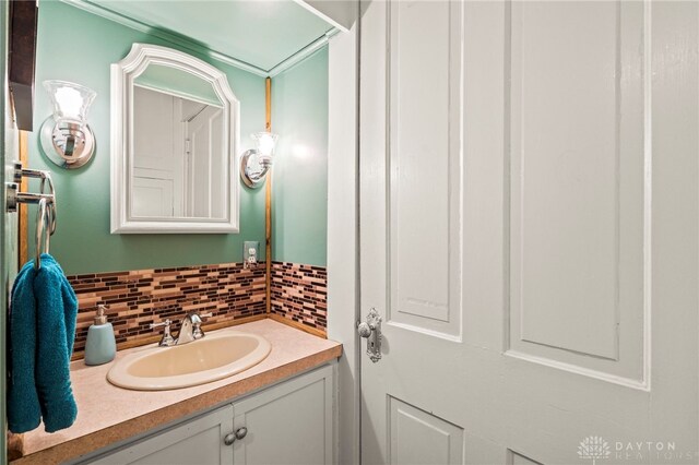 654 S Market St, Troy, OH 45373 - bathroom with vanity and backsplash