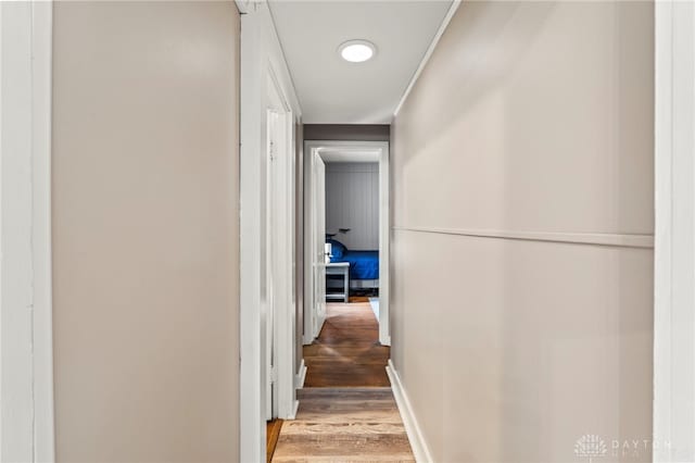 654 S Market St, Troy, OH 45373 - corridor featuring wood finished floors and baseboards