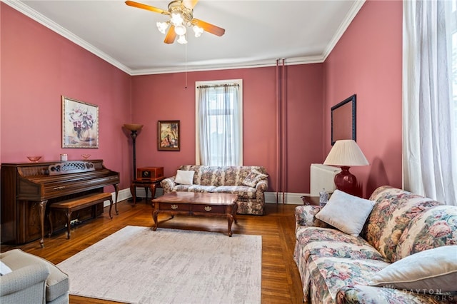 654 S Market St, Troy, OH 45373 - living room featuring a ceiling fan, ornamental molding, and baseboards