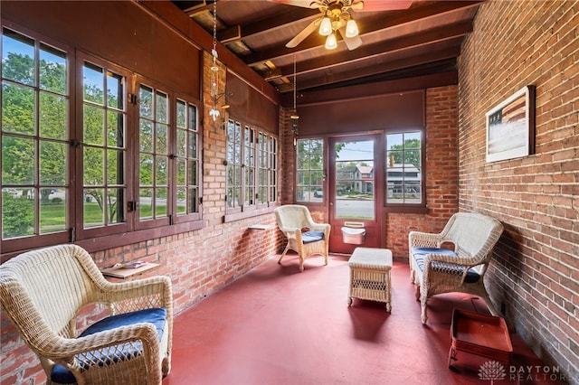 654 S Market St, Troy, OH 45373 - sunroom with brick wall, french doors, beam ceiling, and ceiling fan
