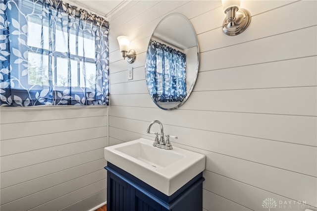 654 S Market St, Troy, OH 45373 - bathroom featuring vanity and ornamental molding