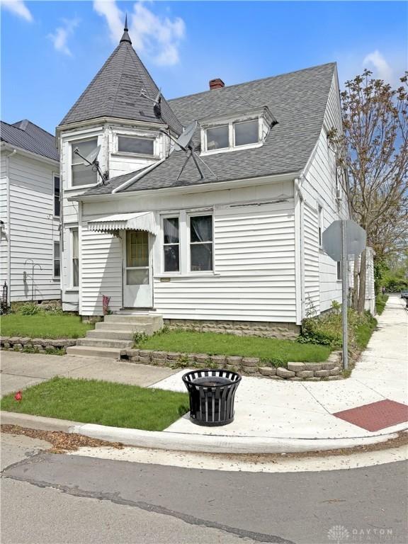 253 E Main St, Versailles, OH 45380 - view of front facade with a shingled roof