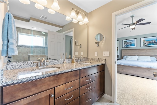 1591 Windham Ln, Beavercreek Township, OH 45385 - ensuite bathroom with a stall shower, double vanity, ceiling fan, and baseboards