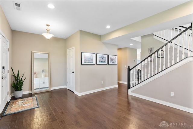 1591 Windham Ln, Beavercreek Township, OH 45385 - foyer entrance featuring wood finished floors, baseboards, stairway, and recessed lighting