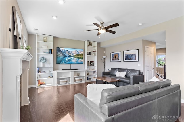 1591 Windham Ln, Beavercreek Township, OH 45385 - living area featuring ceiling fan, dark wood-style floors, built in features, and baseboards