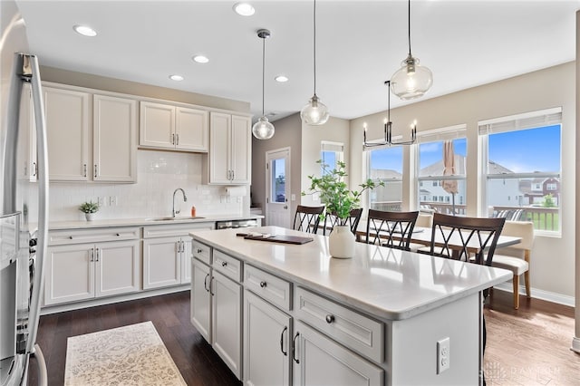 1591 Windham Ln, Beavercreek Township, OH 45385 - kitchen featuring a sink, appliances with stainless steel finishes, white cabinets, light countertops, and recessed lighting