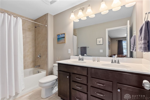 1591 Windham Ln, Beavercreek Township, OH 45385 - bathroom with double vanity, tile patterned flooring, toilet, and shower / bath combo
