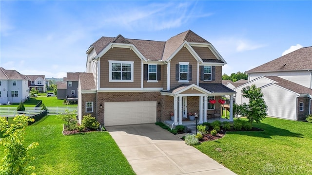 1591 Windham Ln, Beavercreek Township, OH 45385 - view of front of property with brick siding, a garage, covered porch, driveway, and a shingled roof