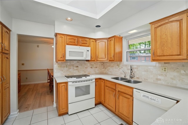 3352 Morning Glory Rd, Dayton, OH 45449 - kitchen with white appliances, a sink, light countertops, and recessed lighting