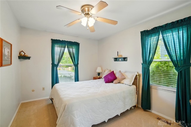 3352 Morning Glory Rd, Dayton, OH 45449 - bedroom featuring carpet, baseboards, and ceiling fan