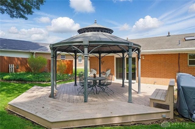 3352 Morning Glory Rd, Dayton, OH 45449 - deck with a gazebo, outdoor dining area, and fence