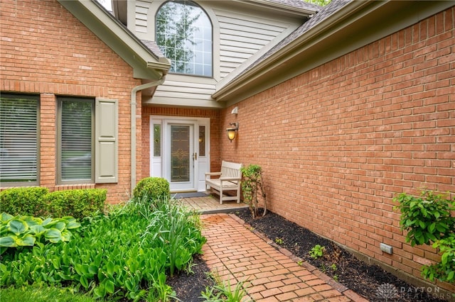 813 Timberlake Ct, Kettering, OH 45429 - view of exterior entry with brick siding and roof with shingles