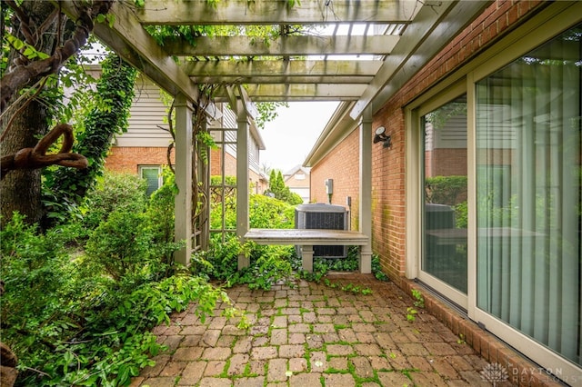 813 Timberlake Ct, Kettering, OH 45429 - view of patio / terrace with cooling unit and a pergola