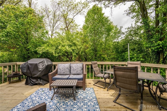 813 Timberlake Ct, Kettering, OH 45429 - wooden deck featuring outdoor dining space, an outdoor hangout area, and a grill