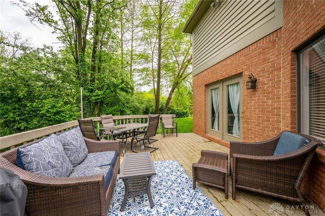 813 Timberlake Ct, Kettering, OH 45429 - deck with outdoor dining area and french doors
