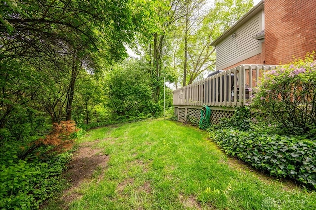 813 Timberlake Ct, Kettering, OH 45429 - view of grassy yard with a wooden deck