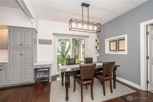 813 Timberlake Ct, Kettering, OH 45429 - dining area with dark wood finished floors and baseboards