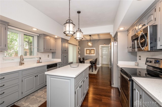 813 Timberlake Ct, Kettering, OH 45429 - kitchen with stainless steel appliances, gray cabinetry, backsplash, and recessed lighting