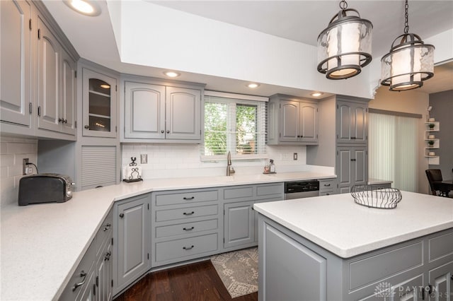 813 Timberlake Ct, Kettering, OH 45429 - kitchen featuring gray cabinets, tasteful backsplash, stainless steel dishwasher, and light countertops