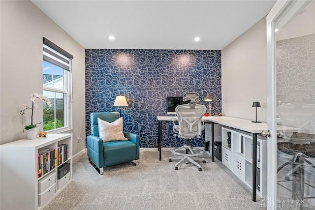carpeted office space with an accent wall, recessed lighting, wallpapered walls, and baseboards