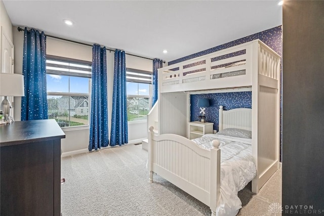 1239 Champion Way, Washington Twp, OH 45458 - bedroom with wallpapered walls, carpet flooring, baseboards, and recessed lighting