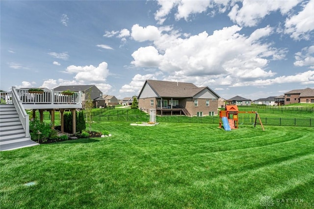 1239 Champion Way, Washington Twp, OH 45458 - view of yard featuring a playground, stairway, a residential view, and a deck