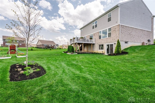1239 Champion Way, Washington Twp, OH 45458 - view of grassy yard with a deck and stairway