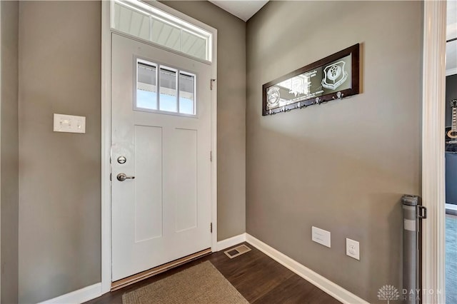 3732 Oak Creek Dr, Sugarcreek Township, OH 45440 - foyer entrance featuring baseboards and dark wood finished floors