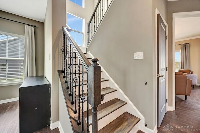 3732 Oak Creek Dr, Sugarcreek Township, OH 45440 - staircase with healthy amount of natural light, baseboards, and wood finished floors