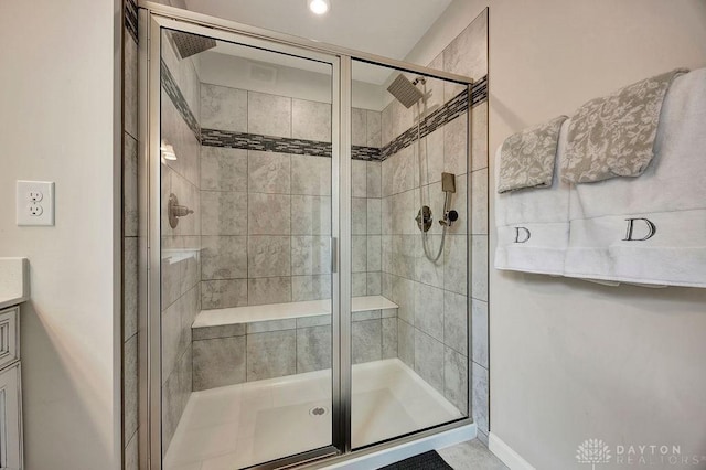 3732 Oak Creek Dr, Sugarcreek Township, OH 45440 - bathroom with a stall shower, vanity, and baseboards