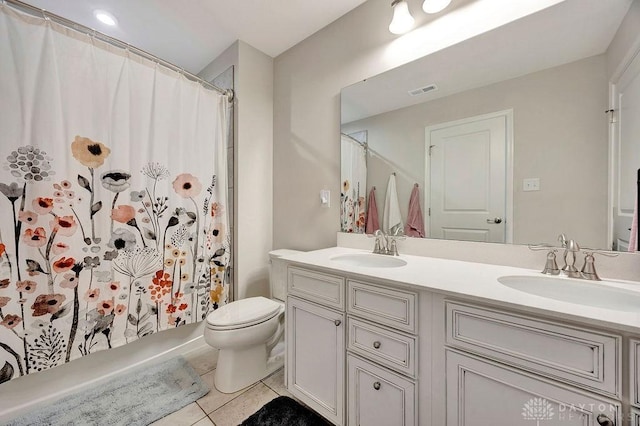 3732 Oak Creek Dr, Sugarcreek Township, OH 45440 - bathroom featuring tile patterned flooring, double vanity, toilet, and a shower with shower curtain
