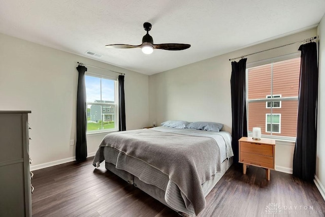 3732 Oak Creek Dr, Sugarcreek Township, OH 45440 - bedroom featuring dark wood-style floors, baseboards, and ceiling fan