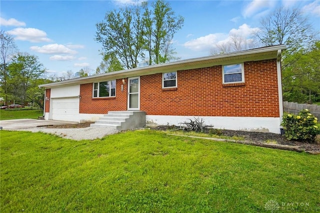 3700 Echo Hill Ln, Beavercreek, OH 45430 - ranch-style house with a garage, brick siding, a front lawn, and driveway
