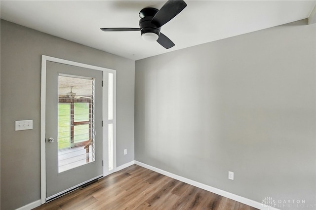 3700 Echo Hill Ln, Beavercreek, OH 45430 - doorway featuring wood finished floors, baseboards, and ceiling fan