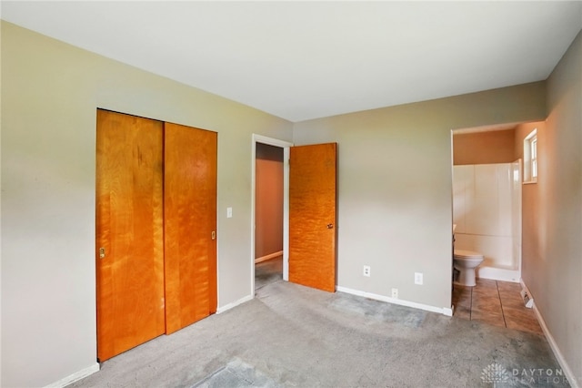 3700 Echo Hill Ln, Beavercreek, OH 45430 - unfurnished bedroom with a closet, baseboards, and carpet floors