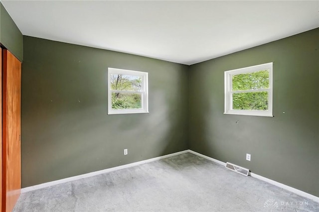 3700 Echo Hill Ln, Beavercreek, OH 45430 - spare room featuring healthy amount of natural light, carpet flooring, and baseboards