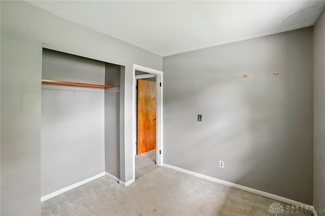 3700 Echo Hill Ln, Beavercreek, OH 45430 - unfurnished bedroom featuring carpet, a closet, and baseboards