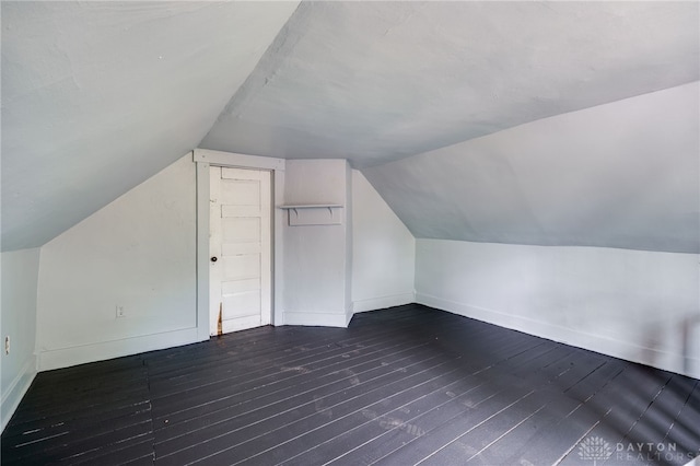 1000 Haviland Ave, Dayton, OH 45410 - additional living space featuring dark wood-style flooring, baseboards, and lofted ceiling