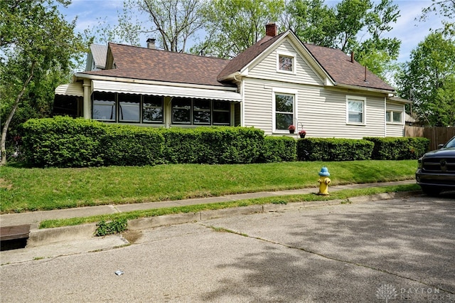 1000 Haviland Ave, Dayton, OH 45410 - back of property with a chimney and a shingled roof