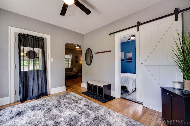1000 Haviland Ave, Dayton, OH 45410 - entryway with a ceiling fan, wood finished floors, arched walkways, and a barn door