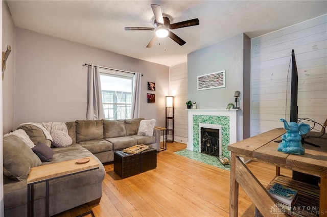 1000 Haviland Ave, Dayton, OH 45410 - living area with a ceiling fan, light wood-style floors, and a fireplace