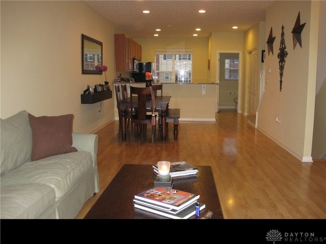 4324 Straight Arrow Rd, Beavercreek, OH 45430 - living area featuring light wood-style flooring, baseboards, and recessed lighting